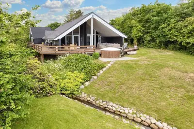 Image de 5 etoiles maison de vacances a Hadsund-By Traum