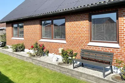 Image de Maison de vacances pour 10 a Ålbæk-By Traum