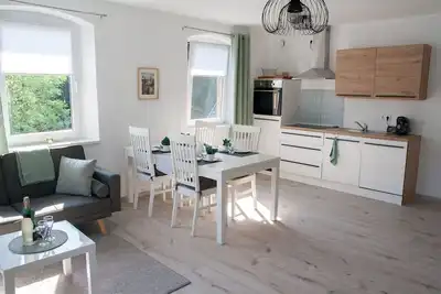 Image de Modern vacation apartment (80 sqm) with covered terrace and garden