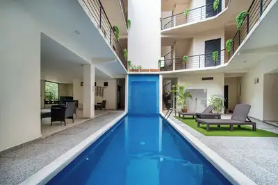 Image de Cozy 1 Bedroom in Tangolunda—near beach, shops & dining. Terrace & pool access!