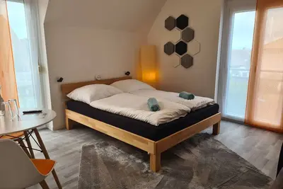 Image de Light-flooded guest room - Mainwiesen