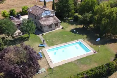Image de Agréable appartement dans une maison de vacances avec climatisation, piscine, Tv, près de Sienne