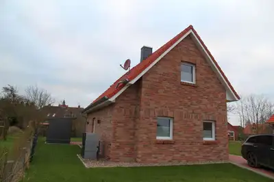 Image de Moor Huus Auszeit - Brand new 85sqm vacation home with dog permit directly on the