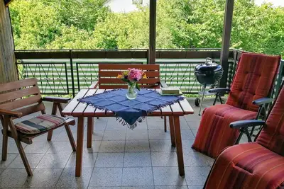 Image de Cozy vacation apartment with covered terrace