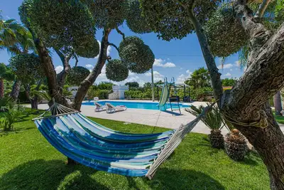 Image de Confortable appartement avec Wifi, piscine privée, climatisation, Tv et parking, près de Ostuni