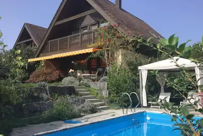 Image de Chalet with swimming pool and panoramic view of the Alps