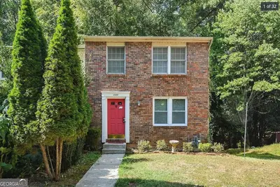 Image de Charming 3-bedroom townhome 20 min downtown Atl, Fire pit, Parking, WiFi/TVs