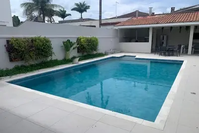 Image de Comfortable house with 4 suites in a luxury condominium in Guaruja