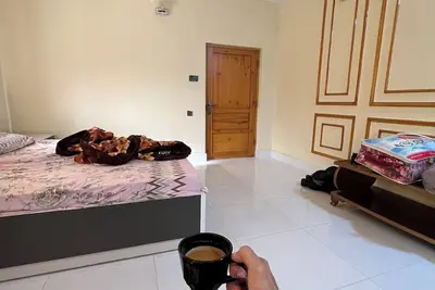 Charming 2-bedroom bungalow with WiFi and Ac in lovely Sukkur plus Swimming Pool