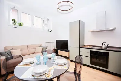 Image de New and Modern apartment 3 steps from Duomo