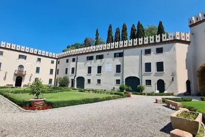 Castle apartment with communal pool and view of Lake Garda