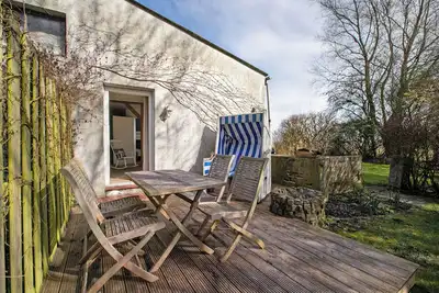 Image de Appartement 'Kleine Heimat' avec terrasse privée, jardin privé et Wi-Fi