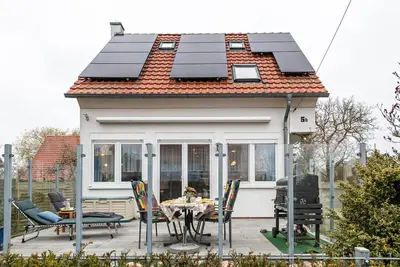 Image de Maison de vacances 'Haus Salzhaff An Der Ostsee' avec terrasse privée et jardin privé
