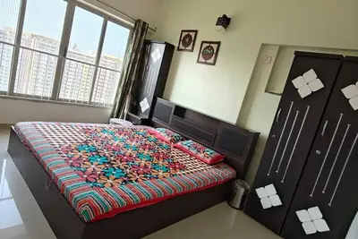 Image de Top Floor with Stadium View in Lush Green Heaven