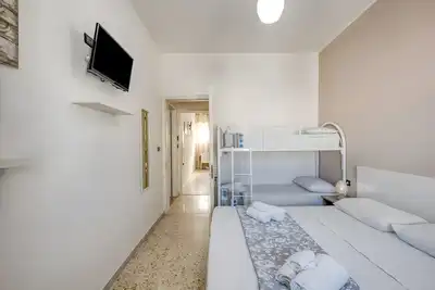 Image de Appartement 'Grande Struttura - Quadrupla' avec balcon, Wi-Fi et climatisation