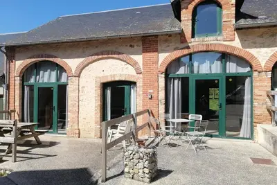 Image de Maison de vacances 'La Maisonnette Du Meslay' avec terrasse privée, jardin partagé et Wi-Fi