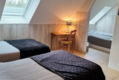 Image de Chambre 'Le Meslay N°4' avec Terrasse partagée, Jardin partagé et Wi-Fi