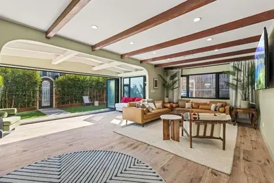 Image de Beachside Getaway with Rooftop Patio, Tesla, Chargers And Rental Car Option!