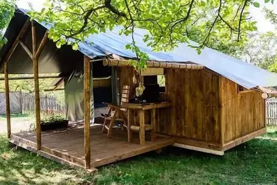 Image de Wohnmobilhütte (10 m² - 1 Schlafzimmer) für 4 Personen