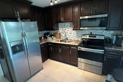 Image de Charming 1 private bedroom in Kissimmee 4 bd home WiFi & Ac close to everything!