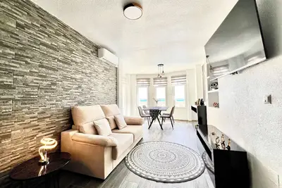 Image de Luxury apartment with sea views & free paddleboard Less than 1min to the beach!