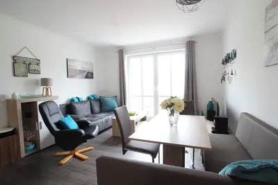 Image de The beautifully furnished vacation apartment \"Zum Strandkorb 22\" is close to the beach and is ideal for families with 1 to 3 children