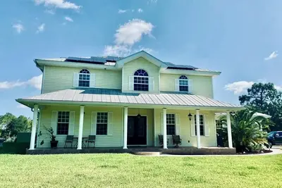 Image de Private & Gated 4-bedroom house with 10. 6 Acres, Game Rooms, Pool, Hot Tub, Bar