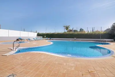 Image de Appartement 'Costa Cabanas 54' avec piscine partagée, jardin partagé et climatisation