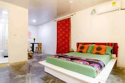 Image de Bedroom with air conditioning and private bathroom near the beach.
