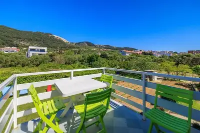 Image de Appartement de deux chambres avec la terrasse Banjol, Rab (A-23094-a)