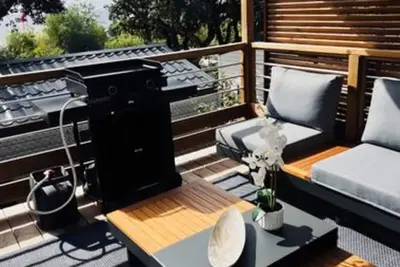 Image de Bungalow 'Mit Meerblick' avec vue sur la mer, piscine partagée et climatisation