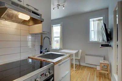 Image de Cozy apartment in charming Quebec with WiFi access