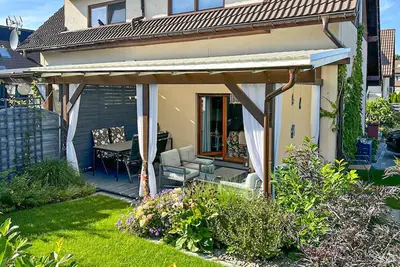 Image de Belle maison Ă Pogorzelica avec WiFi
