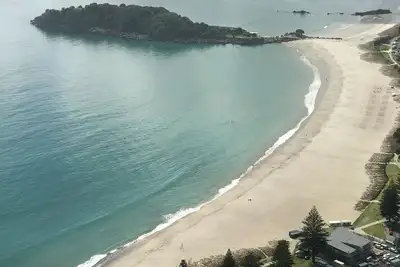 Image de Surf beach batch across from the beach and a short walk to town.