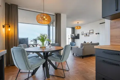 Image de BeltEck vacation apartment - pure sea view. Sauna. Family friendly.