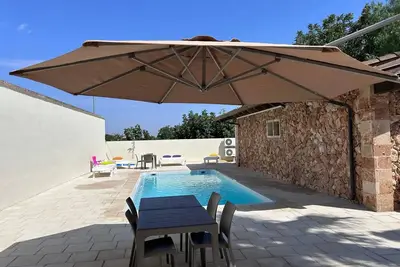 Image de Chambre 'La Pietra Village - Girasole' avec Terrasse partagée, Wi-Fi et Climatisation