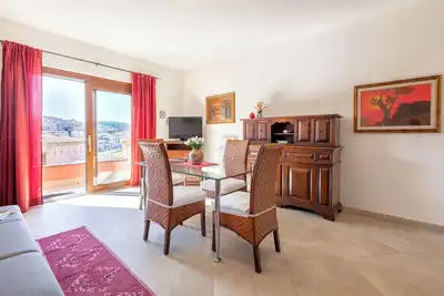 Image de Appartement 'Charlie Beach' avec vue sur mer, balcon et climatisation