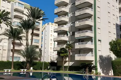 Image de Appartement 'Alquilar Mas Comprar - Canet 1' avec piscine partagée, Wi-Fi et climatisation