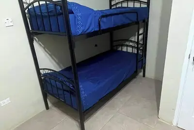 Image de 1 Bed in Shared Dorm - Backpackers Hoatel Montego Bay Ac, Fan & hot water