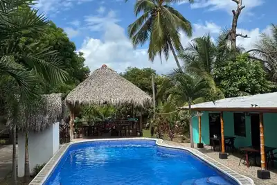 Image de Beachfront Escape in Esterillos Centro - Pool, A/C, WiFi & Private Rooms