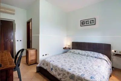 Image de Chambre 'Camera Stabia Con Vista Mare' avec Terrasse partagée, Jardin partagé et Wi-Fi