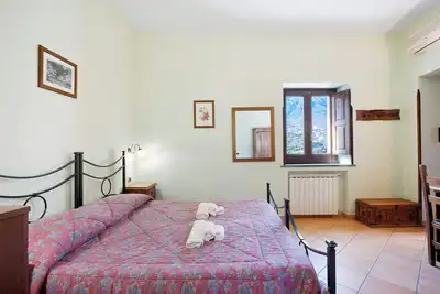 Image de Chambre 'Amalfi Con Vista Monti E Cortile' avec Terrasse partagée, Jardin partagé et Wi-Fi
