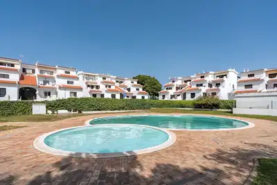 Image de Appartement \"Casa Doce\" avec piscine partagée, Wi-Fi et climatisation