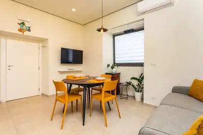 Image de Appartement 'Rosemary Home - Profumi Di Sicilia' avec terrasse partagée, Wi-Fi et climatisation