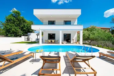 Image de Maison de vacances Barbariga pour 1 - 8 personnes avec 3 chambres à coucher - Maison de vacances