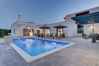 Image de Maison de vacances Pjescana Uvala pour 1 - 8 personnes avec 4 chambres à coucher - Maison de vacance