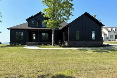 Image de Charming 3-bedroom house in Roland with Ac, gas fireplace, game room and WiFi.