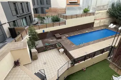 Image de Apartment with pool and parking in Barcelona, ideal for families.