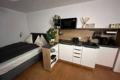 Image de One-room apartment in the arch - One-room apartment