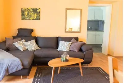 Image de Appartement de vacances 'Silvaner' avec balcon privé, terrasse partagée et jardin commun.